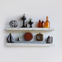 two white shelves with various items on them