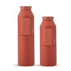 thermos bottles are made out of red plastic