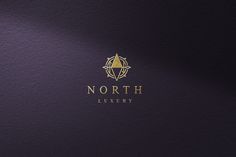 the north luxury logo is shown on a dark background with gold foil and black paper