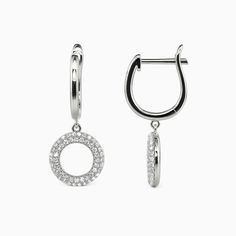 Focusing your attention on these trendy hoop earrings, they'll give you a simple design with fascinating sparkle. Each earring features a shimmering circle frame with two rows of brilliant round stones. Connected by stylish rings, these glamorous accessories create a dangling look that's the perfect way to start your day.Carat Weight: 0.324 ctStone Size: 0.8 mmStone Type: Moissanite/GemstoneNumber of Stones: 108 Stone Shape: RoundStone Color: OptionalWidth: 9.6 mmHeight: 23 mmThickness: 10.8 mmM Circle Frame, Stylish Rings, Circle Frames, Christmas Sale, Simple Design, Personalized Jewelry, Simple Designs, Halo, To Start