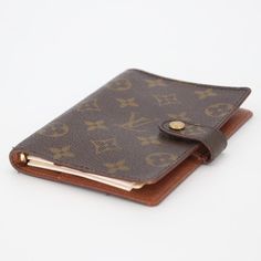 The Louis Vuitton Monogram Canvas Small Ring Agenda Cover will keep you organized at all times. Use it as an agenda, address book or even a notebook. You will want to take this classy and sophisticated accessory with you everyw Makes a perfect gift for someone or for yourself. The exterior canvas is beautiful throughout. The gold-tone hardware has some hairline surface scratches, and minor fading throughout. The interior is clean but the corner do have slight curling on edges however this agenda Planner Book Cover, Louis Vuitton Planner, Chanel Scarf, Agenda Cover, Small Ring, Agenda Planner, Address Book, A Notebook, Pink Sunglasses