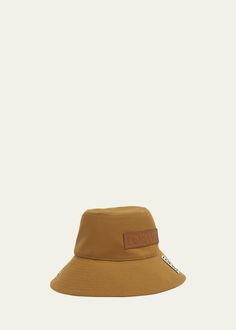 "Find LOEWE Fisherman Orange Bucket Hat on Editorialist. Loewe \"Fisherman\" bucket hat in cotton, linen, and leather Flat crown Embossed logo patch Logo tab Downturned brim Made in Italy" Orange Bucket Hat, Leather Flats, Embossed Logo, Soft White, Cotton Linen, Patch Logo, Bucket Hat, Accessories Hats, Top Brands