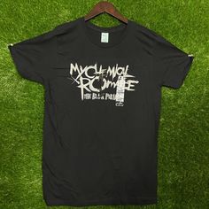 Celebrate Your Love For My Chemical Romance With This Iconic Black Parade Rock Album T-Shirt. Sized Medium, It Measures 19 Inches Pit To Pit And 28 Inches In Length. Comes With The Original Tag. My Chemical Romance Design Black Parade Album Artwork Medium Size, 19" X 28" Original Tag Included Urban Outfitters Brand Classic Black Color Comfortable Fit High-Quality Fabric Durable Print Iconic Rock Band Collectible Item Stylish And Trendy Perfect For Fans Condition: New Without Tags Mcr The Black Parade, Mcr Shirt, Black Parade Album, The Black Parade, Urban Outfitters Shirts, Rock Tshirt, Urban Outfitters Men, Rock T Shirt, Black Parade