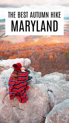 a woman sitting on top of a rock with text overlay reading the best autumn hike in maryland