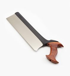 a knife with a wooden handle on a white background