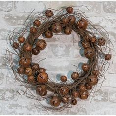 a close up of a wreath on a brick wall