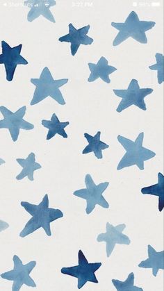 blue watercolor stars are flying in the sky