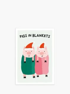 two pigs in blankets with santa hats on their heads and the words pigs in blankets