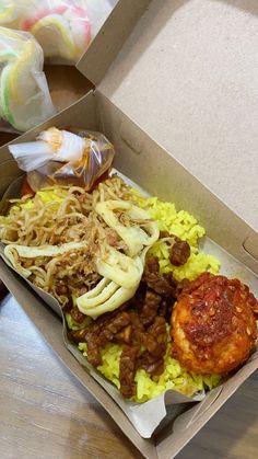 an open take out box filled with food