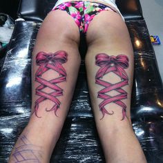 Thigh Corset Tattoo, Under Bum Tattoo Women, Bow Tattoo Thigh, Bum Tattoo Women, Thigh Garter Tattoo, Lace Bow Tattoos, Corset Tattoo, Back Of Leg Tattoos, Cute Thigh Tattoos