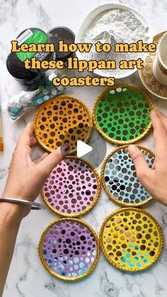 someone is making colorful plates with holes on them