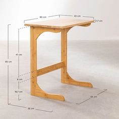 a wooden table with measurements for the legs