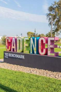 the entrance sign to cadence park in benghark, australia is made out of multicolored letters