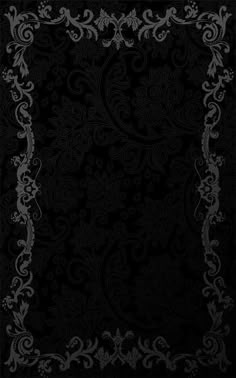 a black and white background with an ornate frame in the middle, on top of it