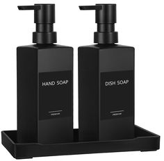 two black soap dispensers sitting on top of each other in front of a white background