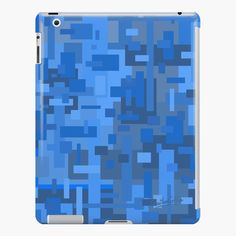 an ipad case with blue squares on the front and back cover, all in different colors