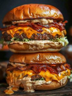 two cheeseburgers stacked on top of each other