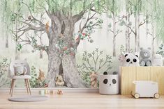 children's room with wallpaper and teddy bears in the woods, including a large tree