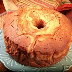 a bundt cake sitting on top of a blue plate