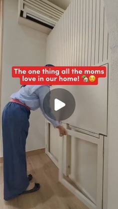 a woman is opening the door to another room with an ad on it that reads, the one thing all the moms love in our home