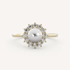 Magnolia features a 6mm pearl center stone with a burst halo on a cathedral basket setting on a half round tapered shank. Wedding Day Jewelry, Custom Wedding Band, Jewelry Education, Trending Engagement Rings, Basket Setting, Ring Trends, Engagement Rings Bridal Sets, Gemstone Engagement, Shop Engagement Rings