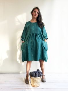 "Incredibly feminine yet comfortable linen tunic dress with handy patch pockets. Masterfully crafted from 100% high quality medium weight European linen with great attention to detail. It will be your favourite go-to item and a great all season investment in your wardrobe. This loose tunic dress is perfect with trousers and leggings or to wear as a dress. Perfect in summer as well as colder months when you can layer over an undershirt or add a jacket to fit all seasons. One size fits most - loos Linen Dress Outfit, Women Black Dress, Linen Tunics For Women, Tunics For Women, Blue Linen Dress, Linen Tunic Dress, Loose Tunic, Plus Size Tunic, Linen Tee