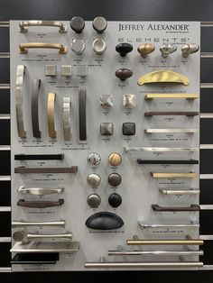 an assortment of different metal objects on display