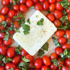 tomatoes, basil and cheese are arranged in a circle on top of each other to make a salad