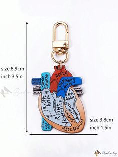 a key chain with a heart and map on it