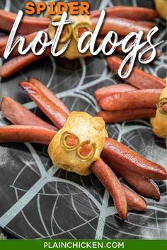 hot dogs and buns on a plate with text overlay that says spider hot dogs