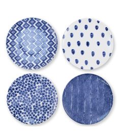 four blue and white plates with different designs on the top one is round, the other has