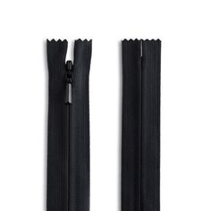 two black zippers are open on a white background