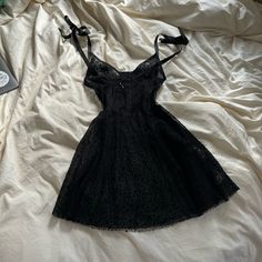 Size M! Runs Small So Perfect For S/M. Unique Lbd. In Great Condition! Black Sleeveless Flirty Mini Dress, Black Sleeveless Coquette Mini Dress, Night Mini Dress With Lace Trim, Night Dresses With Lace Trim And Mini Length, Mini Dress With Lace Trim For Night, Black Lace Trim Dress For Night, Black Lace Mini Length Corset Dress, Black Summer Corset Dress In Flirty Style, Black Fitted Lace Mesh Dress