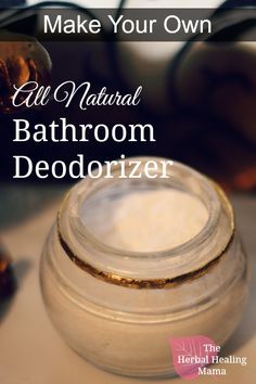 a close up of a jar on a table with the words make your own all natural bathroom deodorizer