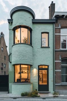 10 Beautiful Houses With Towers Attached (Images Series) Houses With Towers, Tiny Tower, Green Exterior, Landscape Architecture Drawing, Window Detail, Black Window, Unusual Buildings, Black Windows, Beautiful Houses