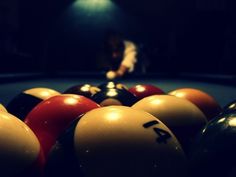 billiards are lined up and waiting for the ball to be thrown into the air