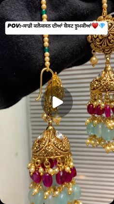 the earrings are being displayed in this video