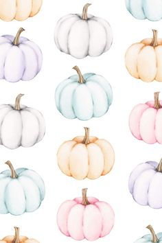 watercolor pumpkins on a white background with different colors and sizes in the middle