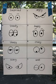 four different types of eyes on a sign