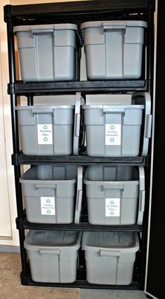 several plastic containers are stacked on a shelf