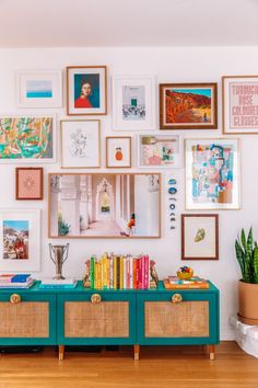 a living room filled with lots of pictures and toys