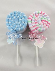 two lollipops are sitting on top of each other