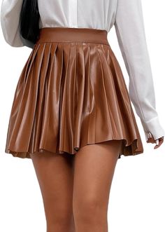 This High Waist Faux Leather Pleated Mini Skirt is expertly crafted using high-quality faux leather, ensuring durability and longevity. The high waist design provides a flattering fit, while the pleated detail adds a touch of elegance. Perfect for making a statement in any outfit. 100% Polyester Machine Wash Fabric has some stretch Feature: PU leather, high waist, pleated hem, skater mini skirt Brand Size Dress Bust Waist Hip XS 0-2 31-32.5'' 23-24'' 31-34" S 4--6 33-35'' 25-26'' 35-37" M 8--10 White Pleated Mini Skirt, Leather Pleated Mini Skirt, High Waisted Pleated Skirt, Winter Knit Hats, Pleated Mini Skirt, Winter Knits, Womens Plaid, Pleated Skirt, Leather Women