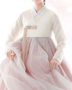 Accessories are not included in the hanbok price. Custom Hanbok All sales are final. Shiping from USA. Referring to the photo on the left, Please provide the above measurements in exact inches for fit. "Hanbok" is the traditional attire of the Korean people. It was worn daily up until just 100 years ago, it was originally designed to facilitate ease of movement. But now, it is only worn on festive occasions or special anniversaries. It is a formal dress and most Koreans keep a hanbok for special times in their life such as wedding, Chuseok (Korean Thanksgiving), and Seollnal (Korean New Year's), Children wear hanbok to celebrate their first birthday. While the traditional hanbok was beautiful in its own right, the design has changed slowly over the generations. The core of hanbok is its gr Elegant Hanbok For Spring Wedding, Elegant Wedding Hanbok For Spring, Elegant White Hanbok For Spring, Elegant Fitted White Hanbok, Wedding Hanbok With Long Sleeves And Fitted Style, Wedding Hanbok With Long Sleeves, Fitted Long Sleeve Wedding Hanbok, White Long Sleeve Hanbok For Spring, Fitted Hanbok For Spring Wedding