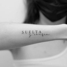 a woman's arm with the word sujetta written on it in cursive writing