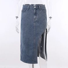 Get ready to turn heads with our Maxi Denim Skirt. This long denim skirt is the perfect blend of style and comfort, making it a must-have addition to your wardrobe. Crafted from high-quality denim, it offers a flattering silhouette and a versatile look that can be dressed up or down. Whether you're heading to the office or out for a night on the town, this Maxi Denim Skirt will keep you looking effortlessly chic. Trendy Mid-rise Denim Blue Skirt, Fitted Dark Wash Denim Skirt, Fitted Denim Skirt In Dark Wash, Relaxed Fit Denim Skirt For Fall, Denim Relaxed Fit Skirt For Fall, Relaxed Denim Skirt For Fall, Mid-rise Medium Wash Cotton Skirt, Dark Wash Relaxed Midi Denim Skirt, Dark Wash Relaxed Denim Midi Skirt