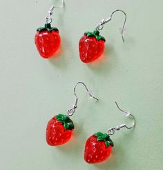 Some cute strawberries to buy for her. Fun Red Resin Earrings, Fun Style Red Resin Earrings, Fun Red Resin Jewelry, Red Resin Novelty Earrings, Novelty Red Resin Jewelry, Red Resin Novelty Jewelry, Trendy Red Resin Earrings, Sweet Red Drop Earrings, Red Plastic Earrings For Gift