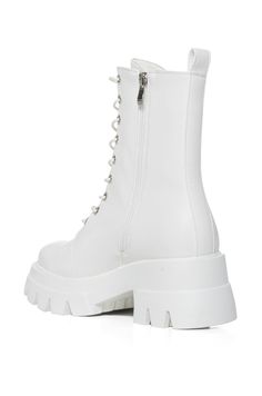 Seriously classic, and easy to style. The AZALEA WANG Siriusi Bootie In White is brought to you in a sleek faux leather upper and features a lace-up shaft, tonal stitching, silver metallic hardware, a durable stacked rubber outsole, and a round toe silhouette. Complete with a mid-calf shaft, a platform lug sole with a coordinating chunky heel, a back ankle pull tab, and an inner ankle zipper closure for optimal support. From skater dresses to an oversized tee with your favorite denim, the possibilities are endless when styling these go-to beauties.
(all measurements are approximate from size 7.5)
- Faux Leather Upper
- Almond Toe
- Mid-Calf Shaft
- 2.5” Heel Height
- 1.5” Sole Height
- 7” Shaft Height
- 11.25” Circumference
- Imported
Product ID: 379072 White Chunky Boots, White Leather Shoes, Shoe Boot, Azalea Wang, Skater Dresses, Leather Boot Shoes, White Boots, Chunky Boots, Oversized Tee