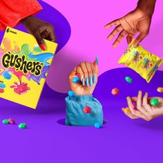 two hands reaching out to grab candy from a yellow box with gummy's written on it