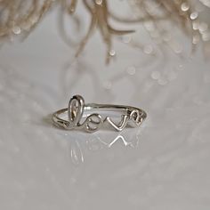 Script Love Ring, Sterling Silver, Dainty Love Ring, 925 Stamped, Non Tarnish, Top Of Ring Height: 7.8m Top Of Ring Width: 17.5mm Band Width: 1.6mm Shank Width: 1.6mm Metal: 925 Sterling Silver Plating: Rhodium Plated Finish: High Polish 925 Stamped K E E P I N T O U Ch Https://Instagram.Com/Emmaverajewelry Https://Www.Facebook.Com/Emmaveradesign Thank You For Visiting Handmade Rings, Love Ring, Ring Sterling Silver, Womens Jewelry Rings, Rhodium Plated, Jewelry Art, Diy Jewelry, Sterling Silver Rings, Handmade Jewelry